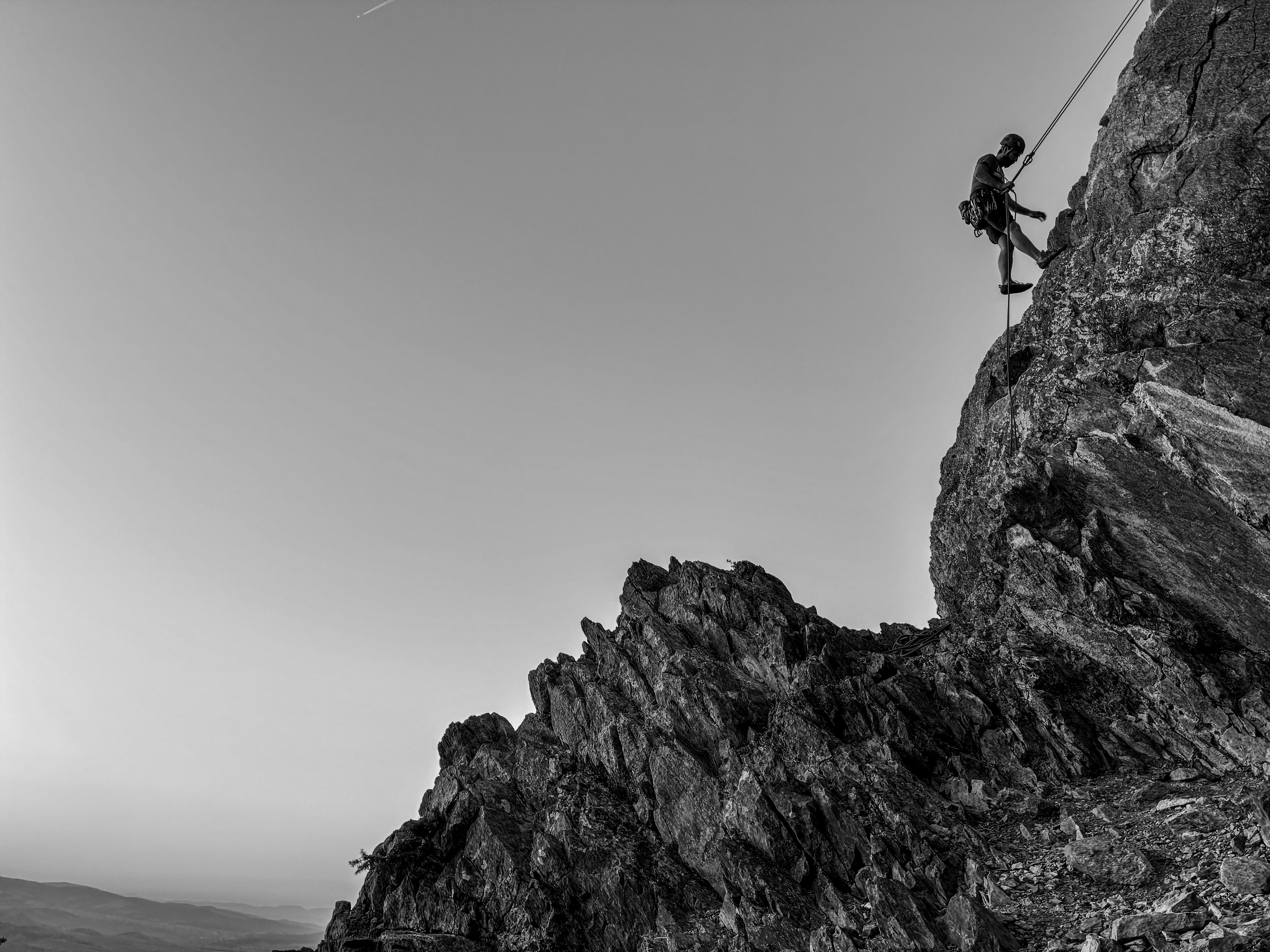 Mount Helena - Climber rappelling down from the top, Helena, Montana